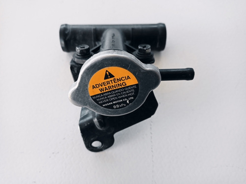 TOMA AGUA NS MARCH VERSA /BASE TAPON ANTICONG TN023-KN